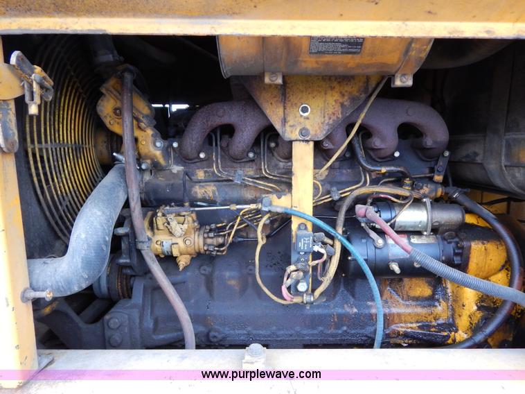image for item H3390 1989 John Deere 670B motor grader