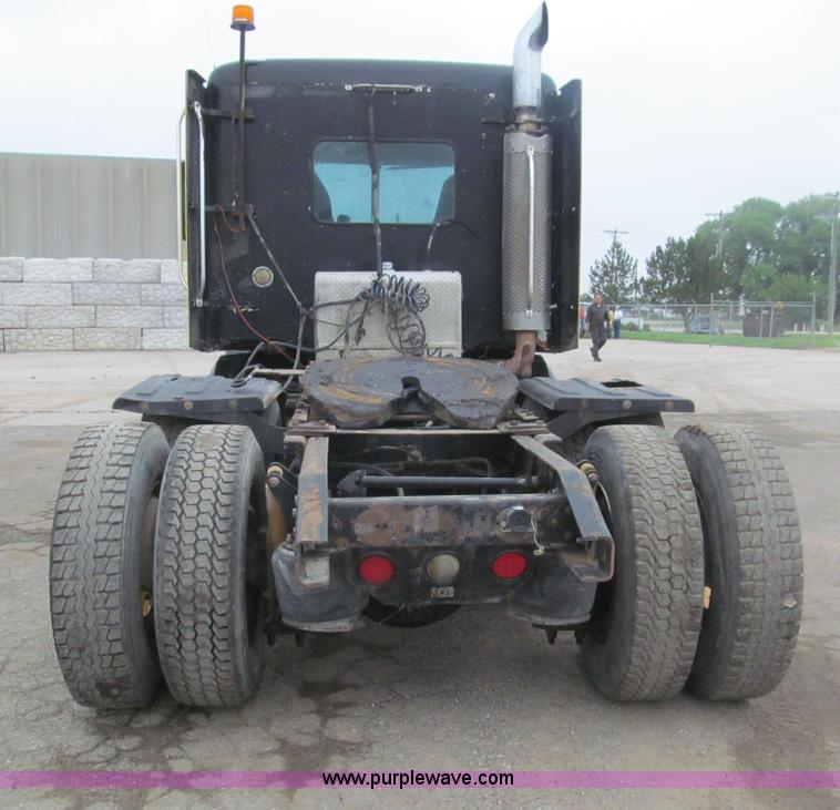 image for item H8999 1999 Freightliner FLC120 semi truck