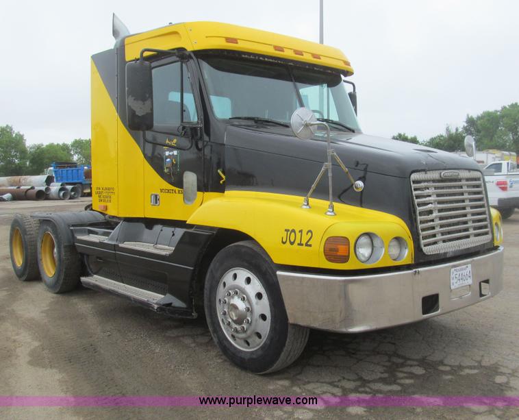 image for item H8999 1999 Freightliner FLC120 semi truck
