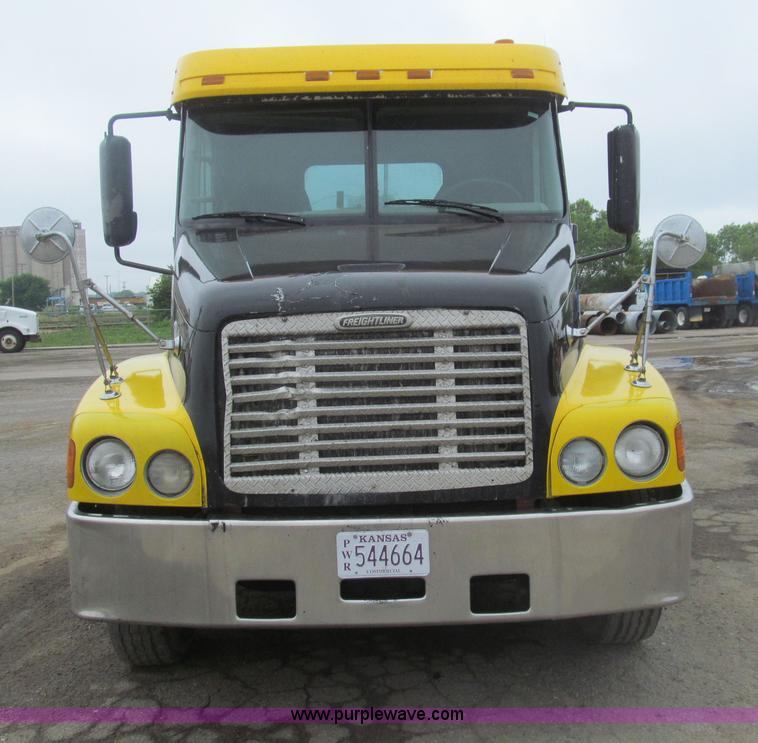image for item H8999 1999 Freightliner FLC120 semi truck