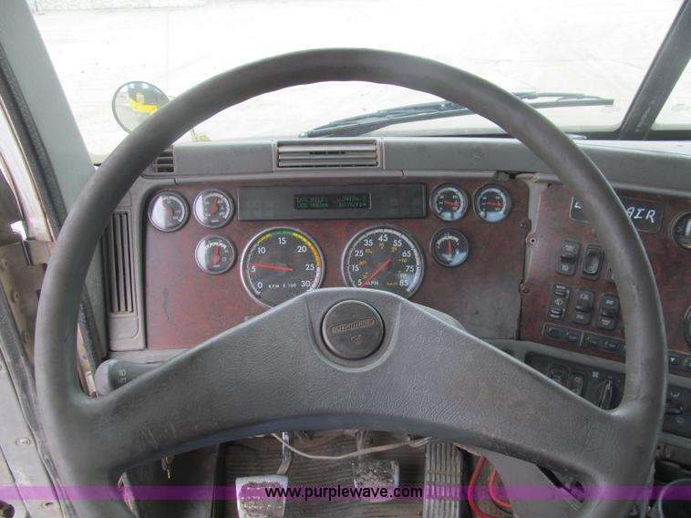 image for item H8999 1999 Freightliner FLC120 semi truck