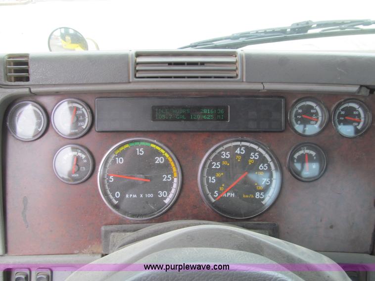 image for item H8999 1999 Freightliner FLC120 semi truck