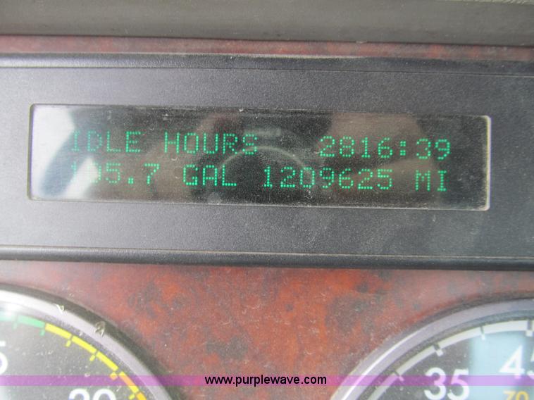 image for item H8999 1999 Freightliner FLC120 semi truck