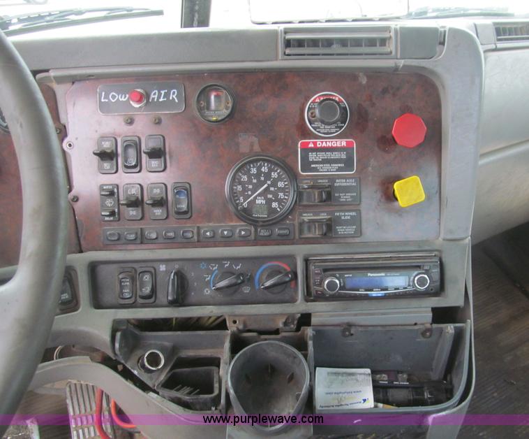 image for item H8999 1999 Freightliner FLC120 semi truck