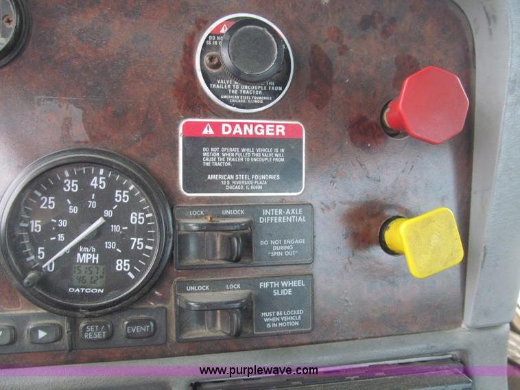 image for item H8999 1999 Freightliner FLC120 semi truck