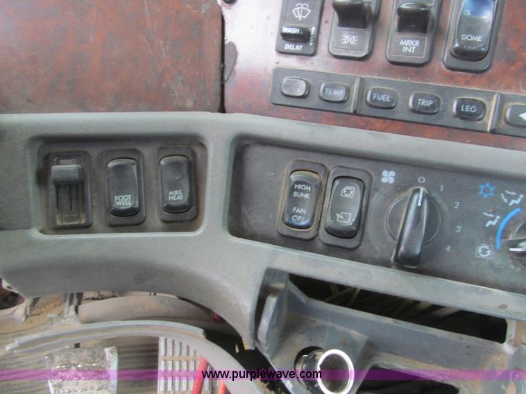 image for item H8999 1999 Freightliner FLC120 semi truck