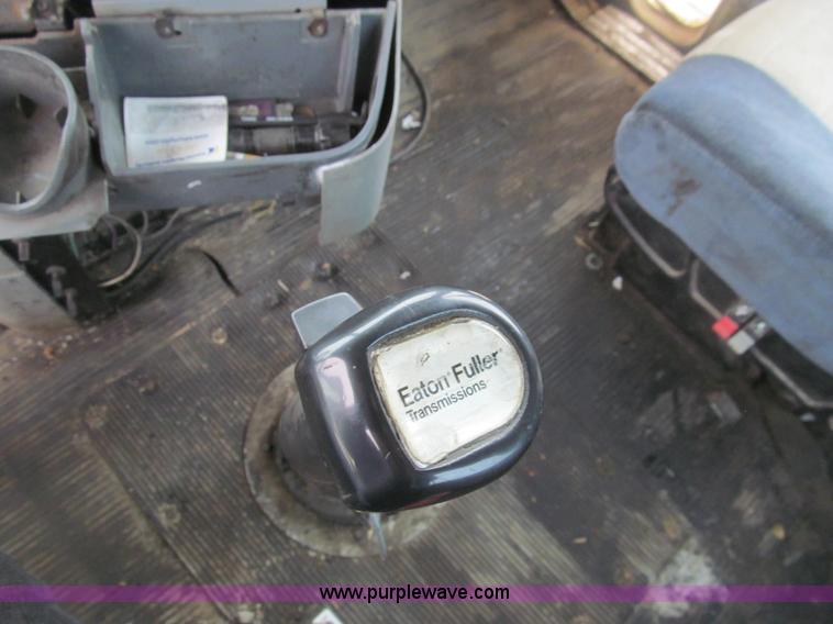 image for item H8999 1999 Freightliner FLC120 semi truck