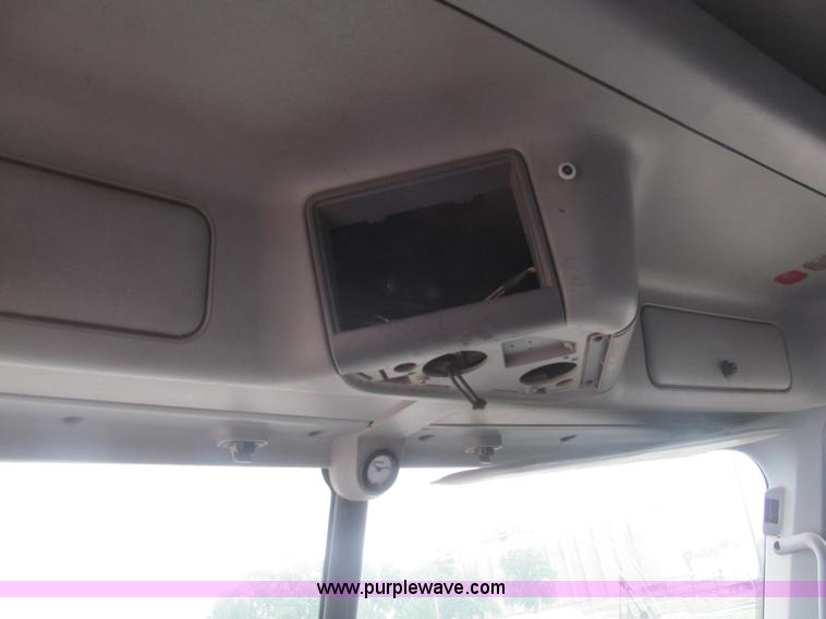 image for item H8999 1999 Freightliner FLC120 semi truck