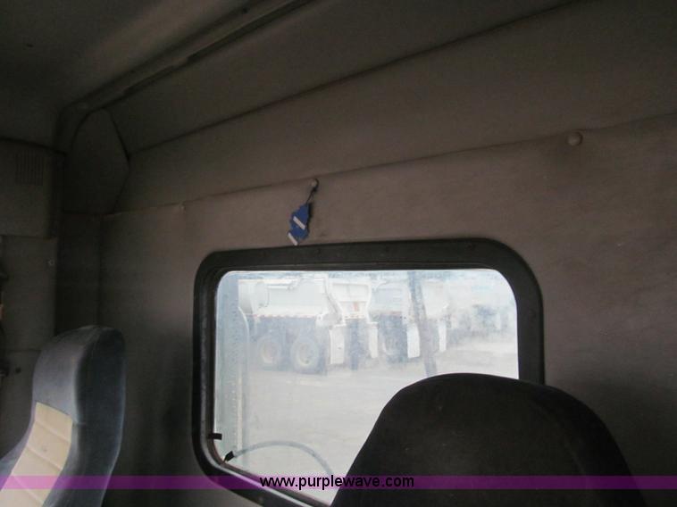 image for item H8999 1999 Freightliner FLC120 semi truck