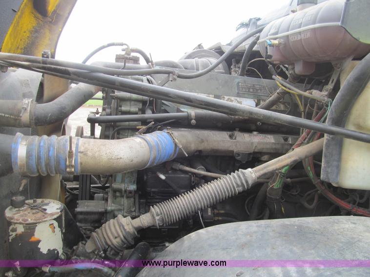 image for item H8999 1999 Freightliner FLC120 semi truck