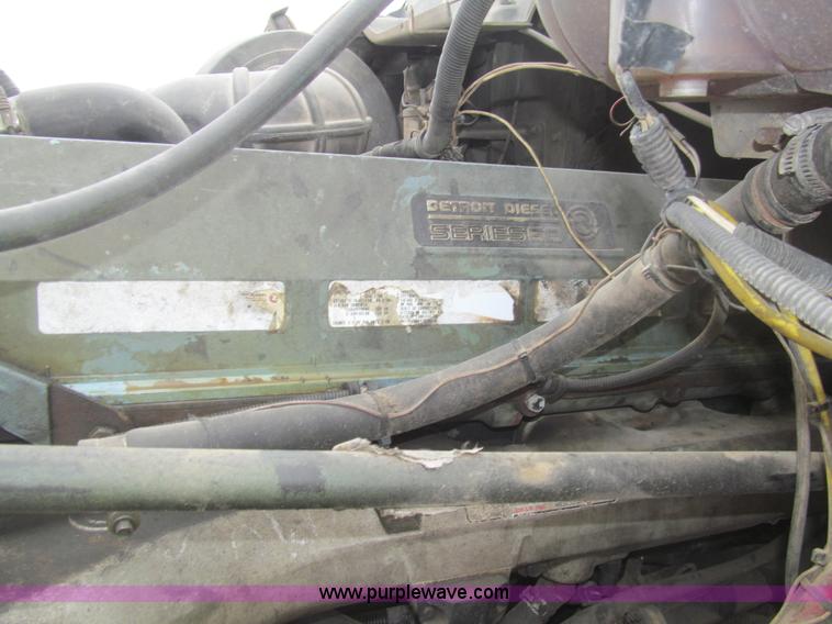 image for item H8999 1999 Freightliner FLC120 semi truck