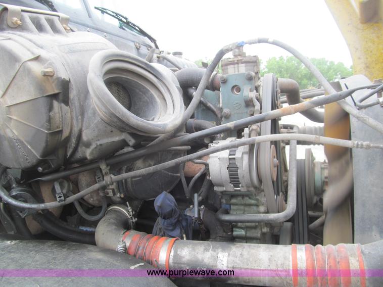 image for item H8999 1999 Freightliner FLC120 semi truck