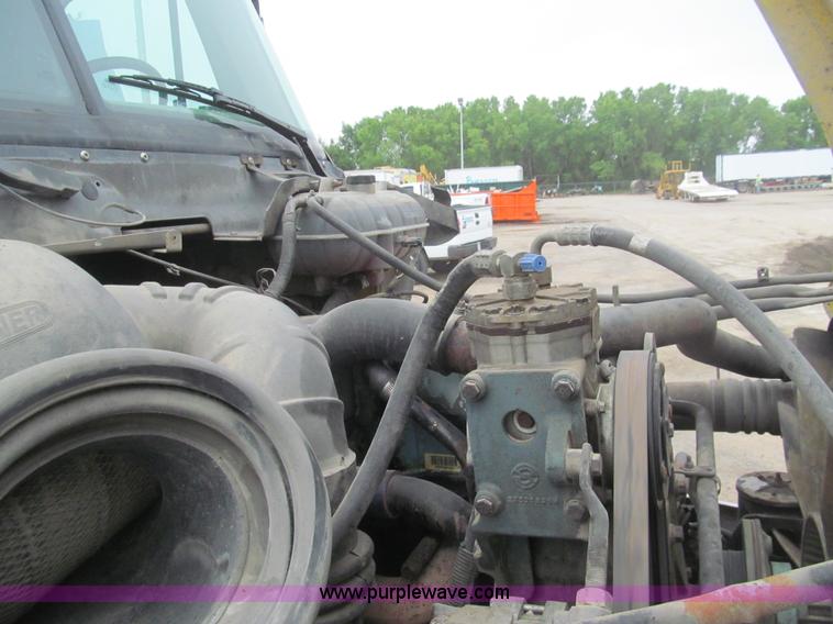 image for item H8999 1999 Freightliner FLC120 semi truck