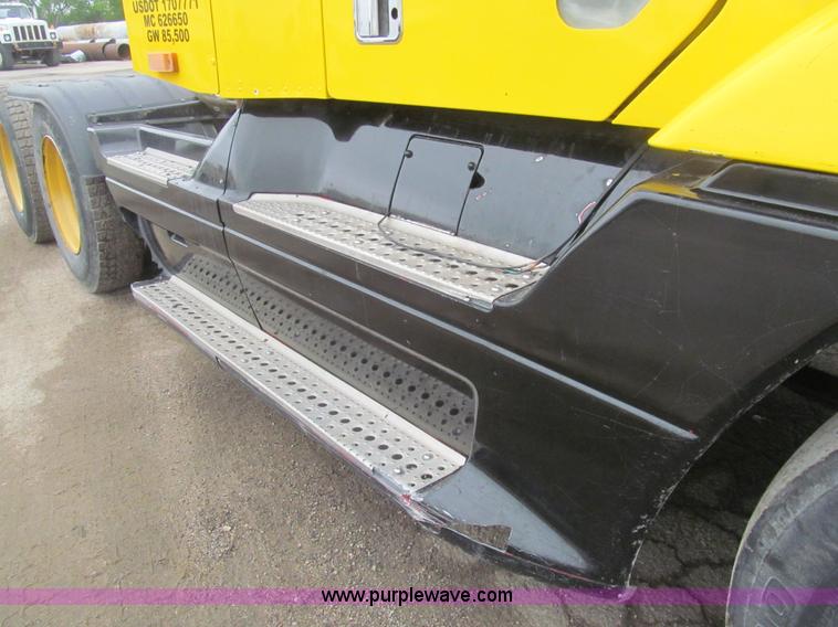 image for item H8999 1999 Freightliner FLC120 semi truck