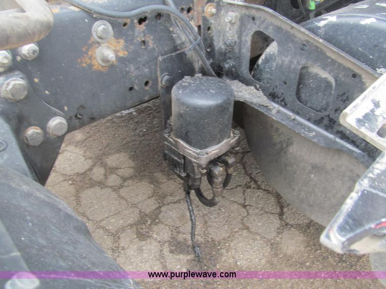 image for item H8999 1999 Freightliner FLC120 semi truck