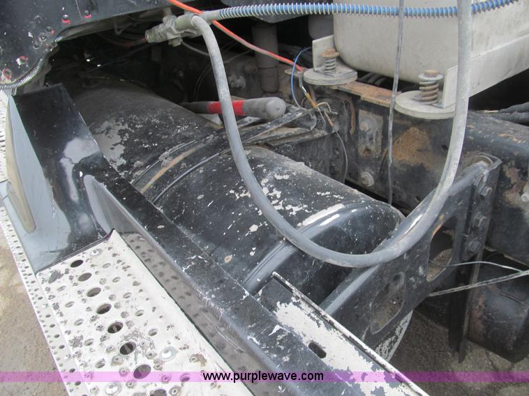 image for item H8999 1999 Freightliner FLC120 semi truck