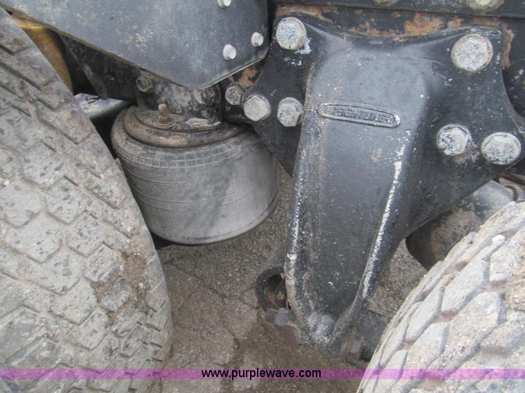 image for item H8999 1999 Freightliner FLC120 semi truck