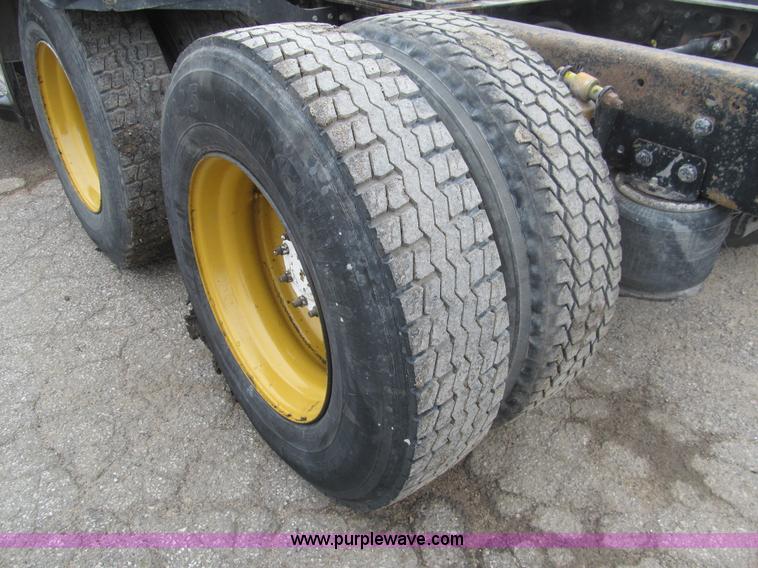 image for item H8999 1999 Freightliner FLC120 semi truck