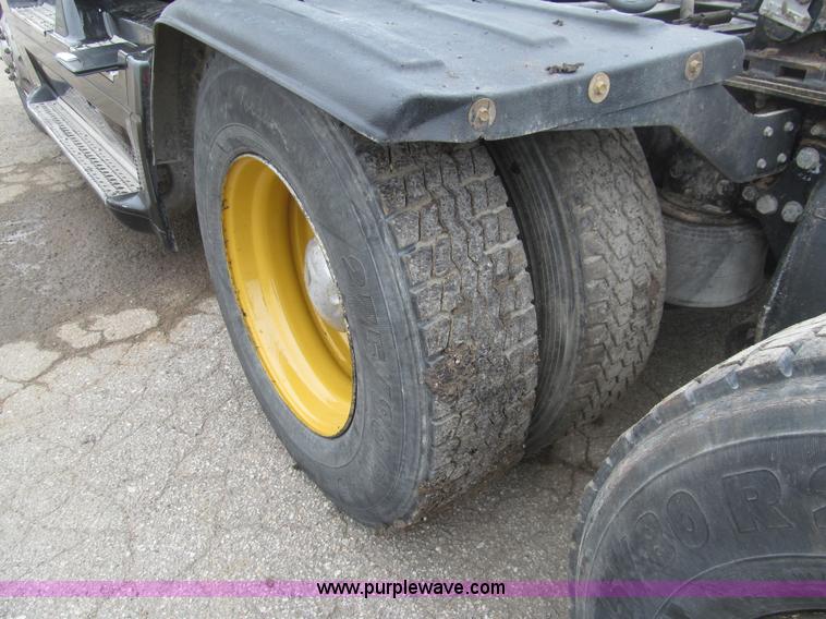 image for item H8999 1999 Freightliner FLC120 semi truck