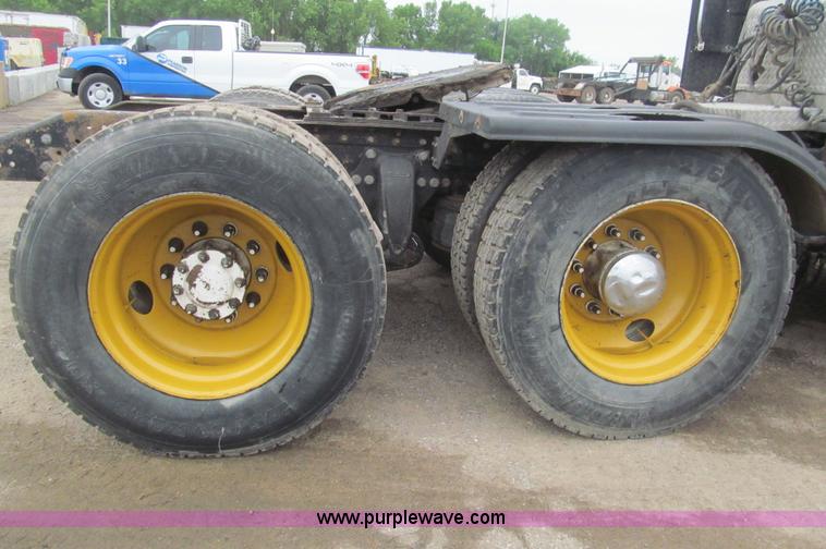 image for item H8999 1999 Freightliner FLC120 semi truck