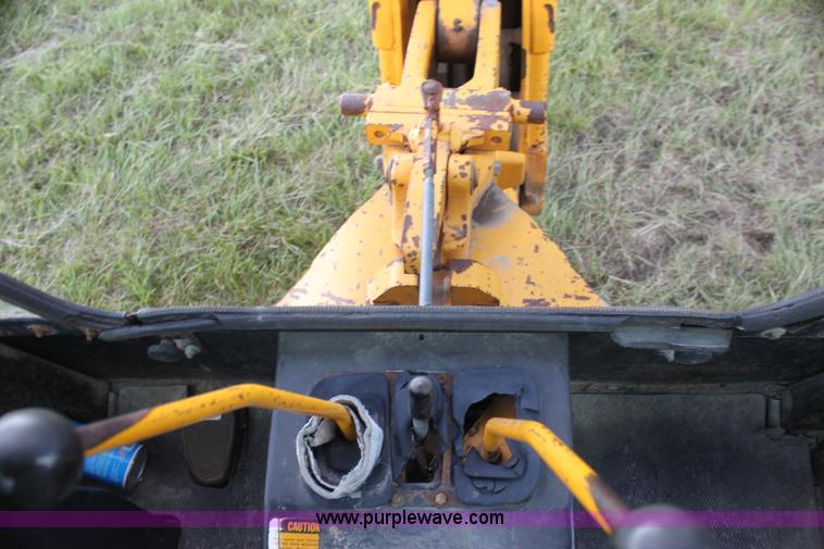 image for item I7382 1988 John Deere 710B backhoe