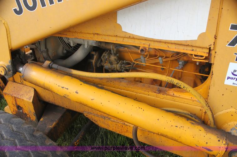 image for item I7382 1988 John Deere 710B backhoe