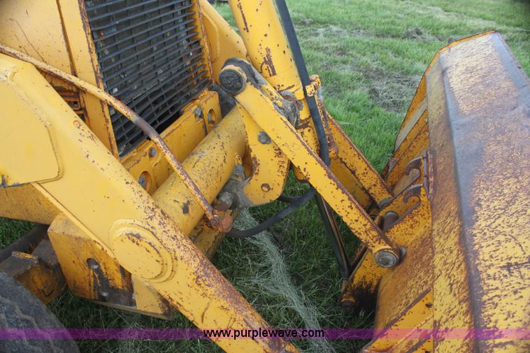 image for item I7382 1988 John Deere 710B backhoe