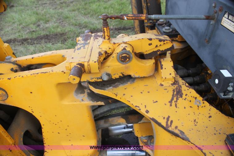 image for item I7382 1988 John Deere 710B backhoe