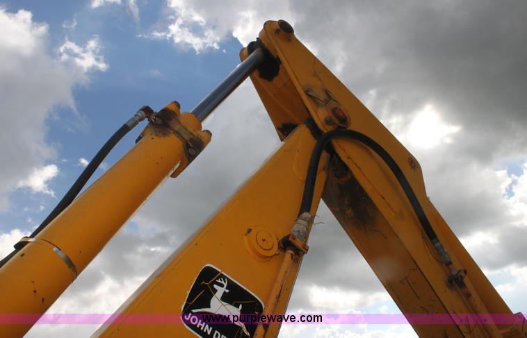 image for item I7382 1988 John Deere 710B backhoe