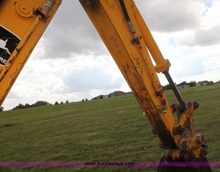 image for item I7382 1988 John Deere 710B backhoe