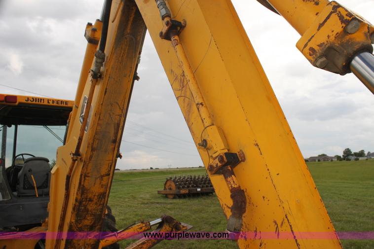 image for item I7382 1988 John Deere 710B backhoe