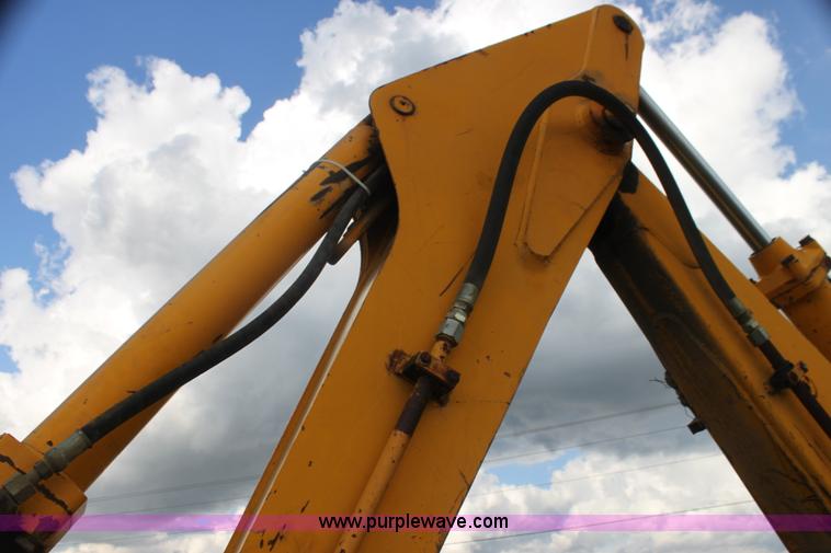 image for item I7382 1988 John Deere 710B backhoe