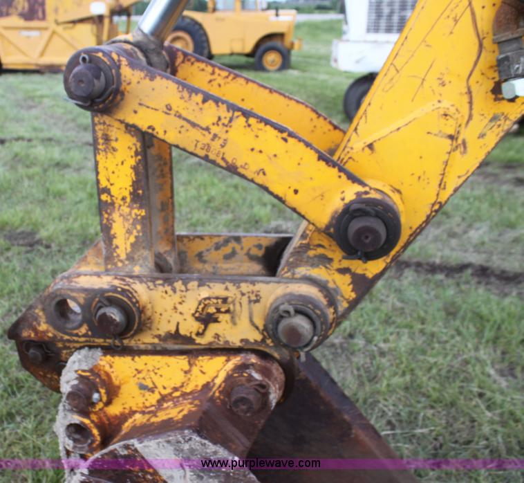 image for item I7382 1988 John Deere 710B backhoe