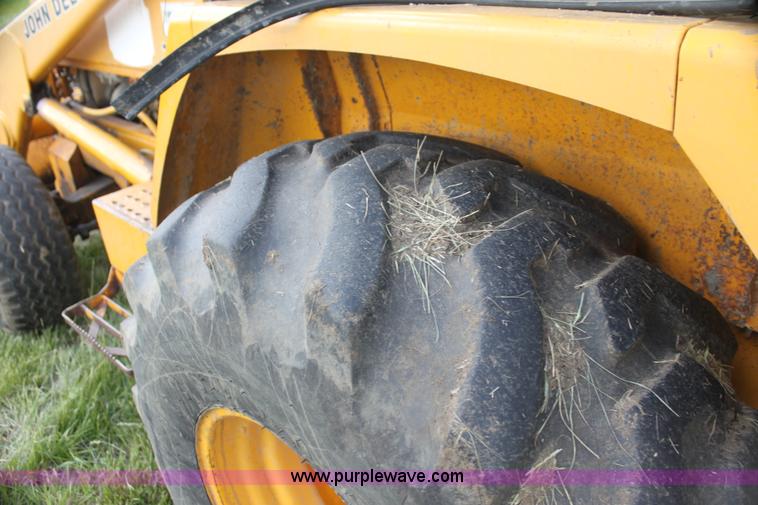 image for item I7382 1988 John Deere 710B backhoe