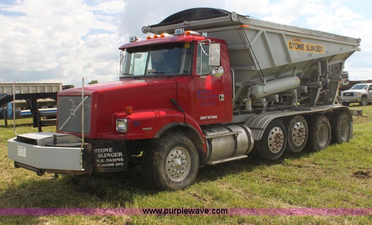 image for item I7395 2001 Volvo WG Super Stone Slinger semi truck