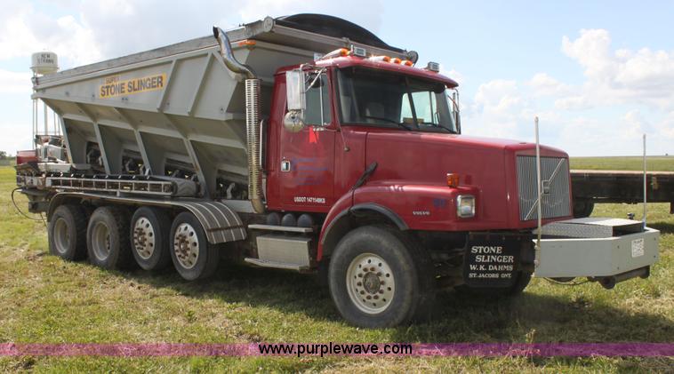 image for item I7395 2001 Volvo WG Super Stone Slinger semi truck