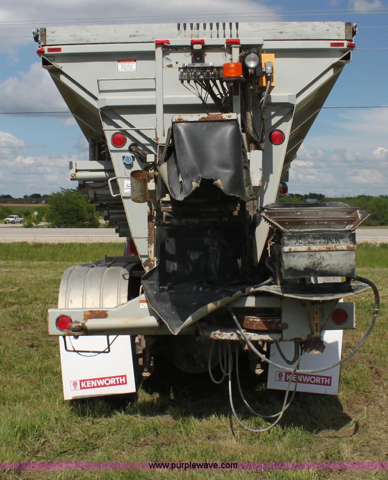 image for item I7395 2001 Volvo WG Super Stone Slinger semi truck