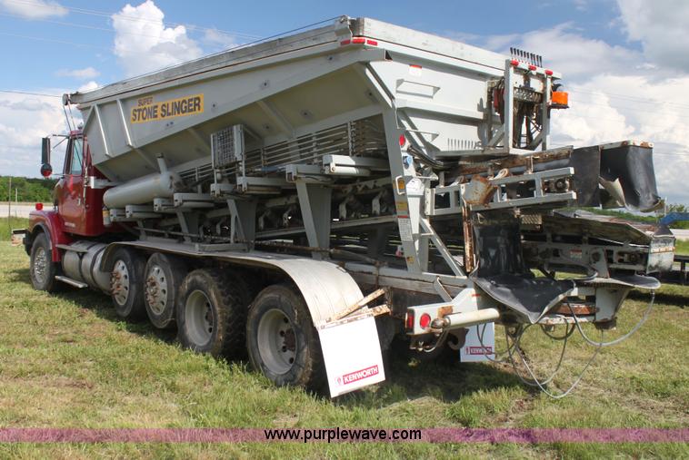 image for item I7395 2001 Volvo WG Super Stone Slinger semi truck