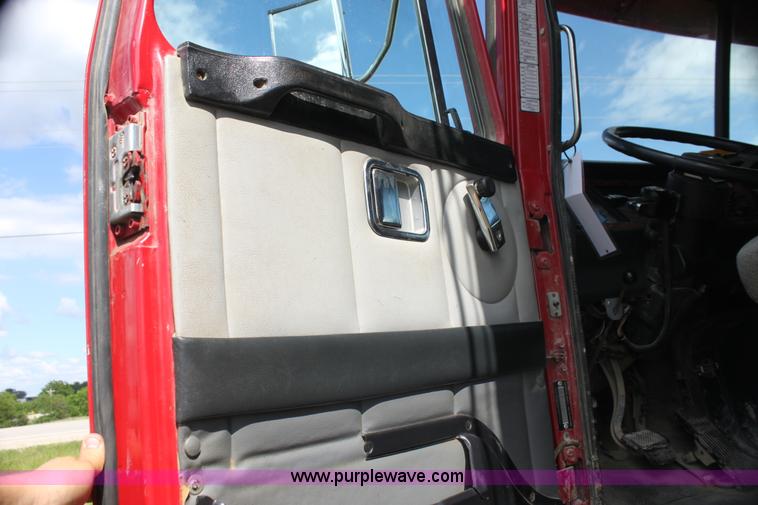 image for item I7395 2001 Volvo WG Super Stone Slinger semi truck