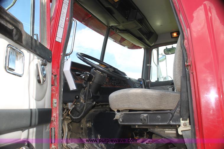 image for item I7395 2001 Volvo WG Super Stone Slinger semi truck