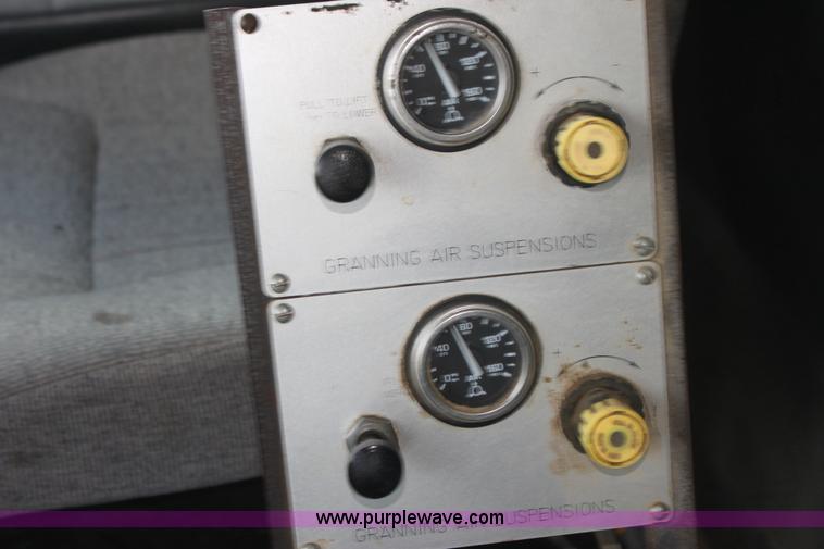 image for item I7395 2001 Volvo WG Super Stone Slinger semi truck