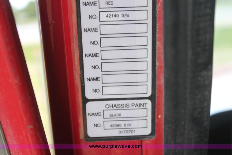 image for item I7395 2001 Volvo WG Super Stone Slinger semi truck