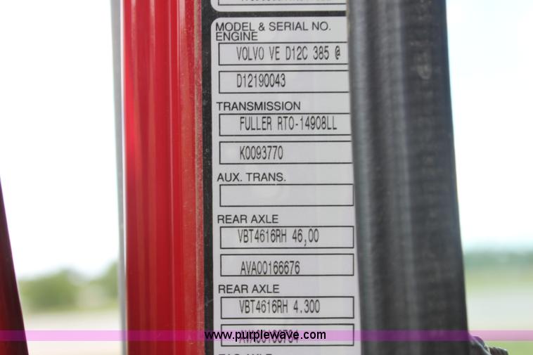 image for item I7395 2001 Volvo WG Super Stone Slinger semi truck