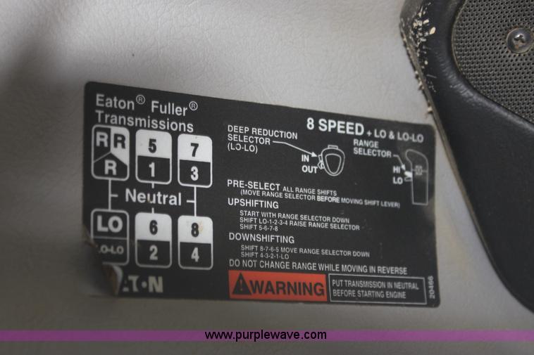 image for item I7395 2001 Volvo WG Super Stone Slinger semi truck