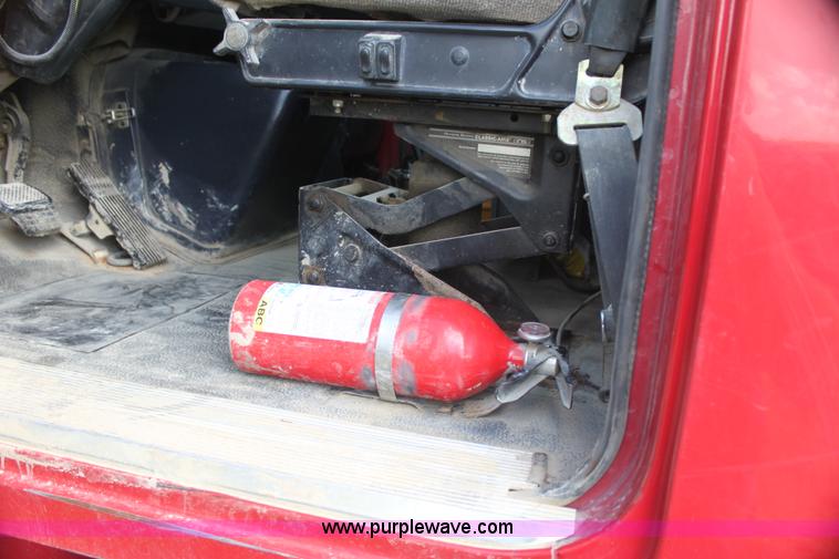 image for item I7395 2001 Volvo WG Super Stone Slinger semi truck