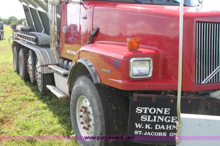image for item I7395 2001 Volvo WG Super Stone Slinger semi truck
