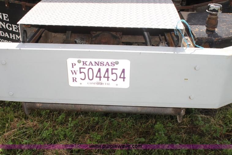 image for item I7395 2001 Volvo WG Super Stone Slinger semi truck