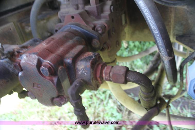 image for item I7395 2001 Volvo WG Super Stone Slinger semi truck