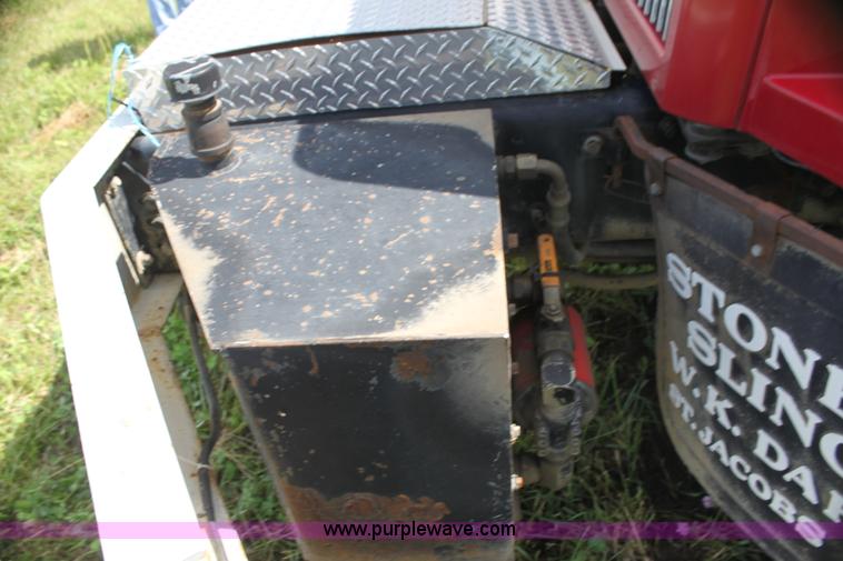 image for item I7395 2001 Volvo WG Super Stone Slinger semi truck