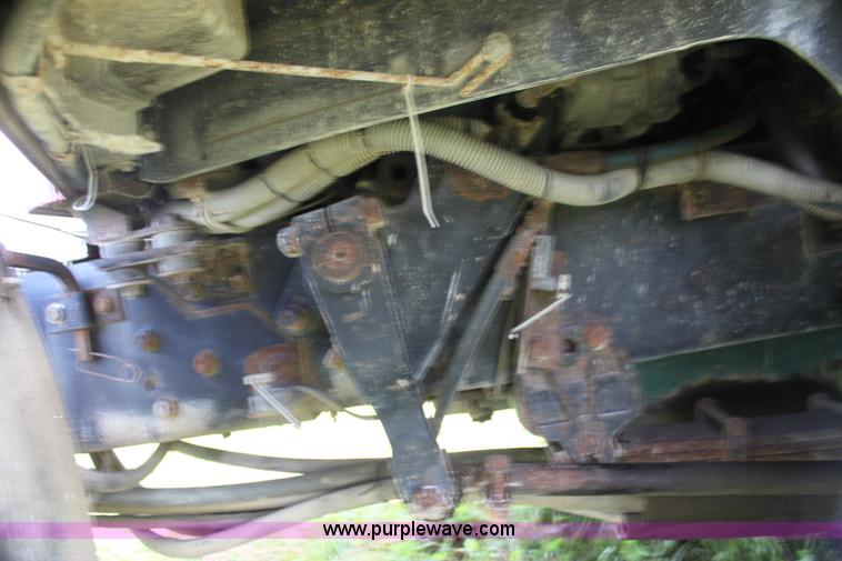 image for item I7395 2001 Volvo WG Super Stone Slinger semi truck